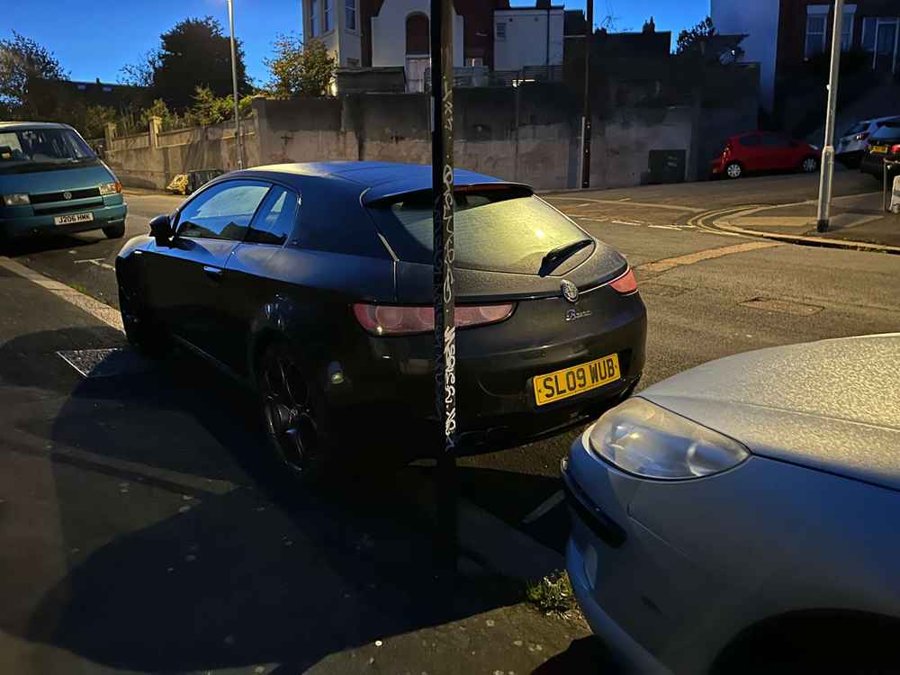 Photograph of SL09 WUB - a Black Alfa Romeo Brera parked in Hollingdean by a non-resident. The second of forty-four photographs supplied by the residents of Hollingdean.