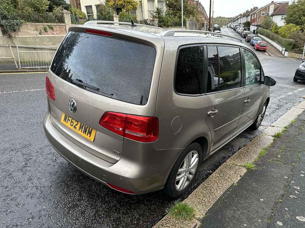 Photograph of WF62 MWM - a Gold Volkswagen Touran parked in Hollingdean by a non-resident.