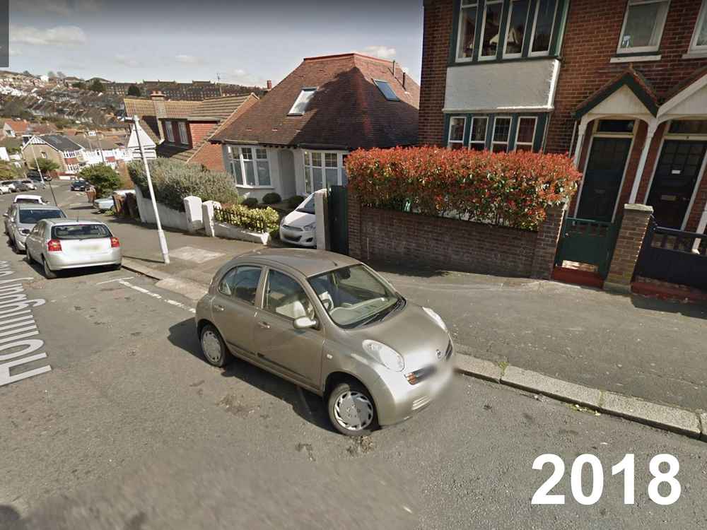 Photograph of LC03 FYJ - a Gold Nissan Micra parked in Hollingdean by a non-resident, and potentially abandoned. The twenty-seventh of twenty-eight photographs supplied by the residents of Hollingdean.