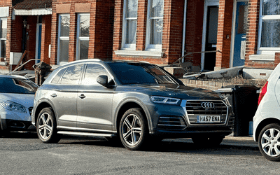 HA57 ENA, a Grey Audi Q5 parked in Hollingdean