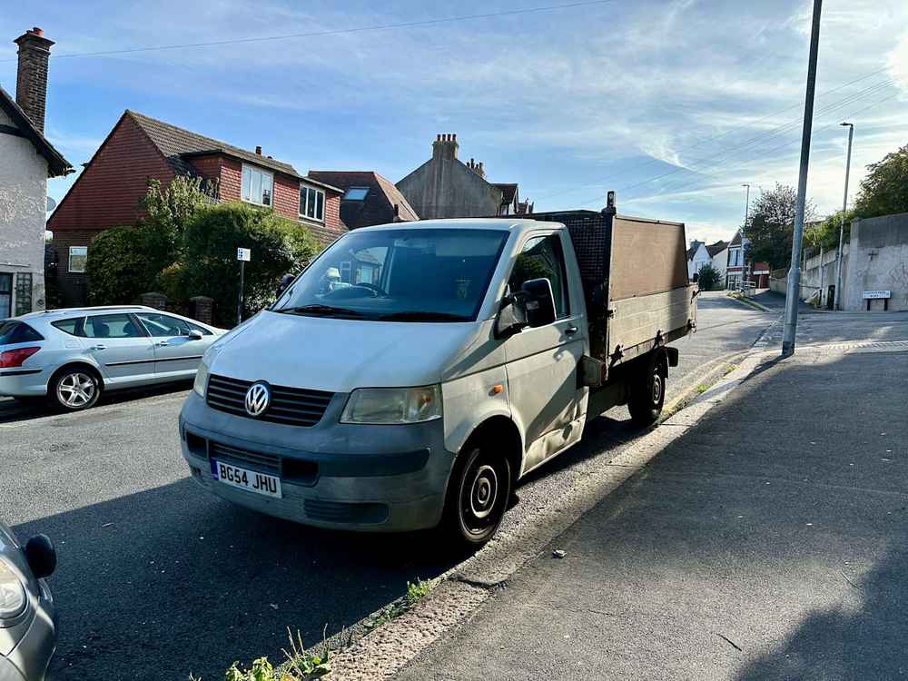 Photograph of BG54 JHU - a White Volkswagen T-Sporter parked in Hollingdean by a non-resident. The first of thirty-two photographs supplied by the residents of Hollingdean.