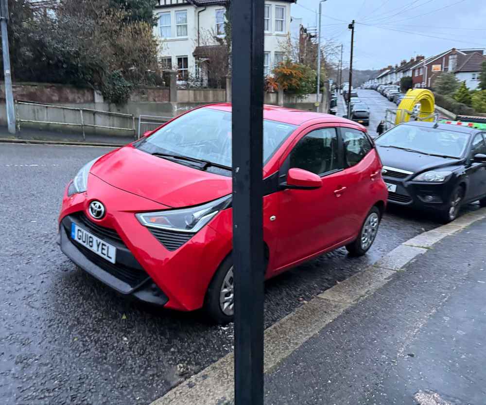 Photograph of GU18 YEL - a Red Toyota Aygo parked in Hollingdean by a non-resident. The twelfth of twelve photographs supplied by the residents of Hollingdean.