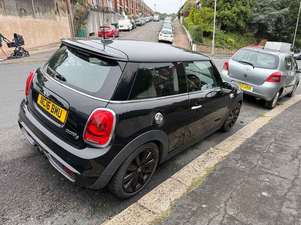 Photograph of NC16 BMU - a Black Mini Cooper parked in Hollingdean by a non-resident who uses the local area as part of their Brighton commute. The eleventh of thirteen photographs supplied by the residents of Hollingdean.