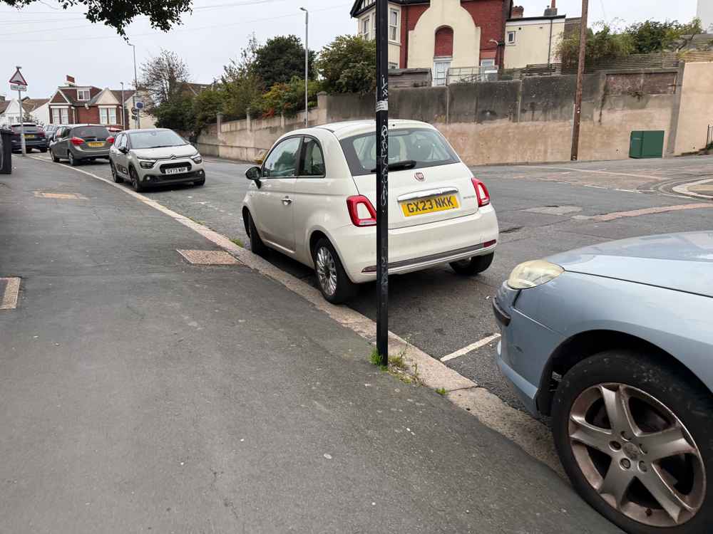 Photograph of GX23 NKK - a White Fiat 500 parked in Hollingdean by a non-resident who uses the local area as part of their Brighton commute. The fourth of four photographs supplied by the residents of Hollingdean.