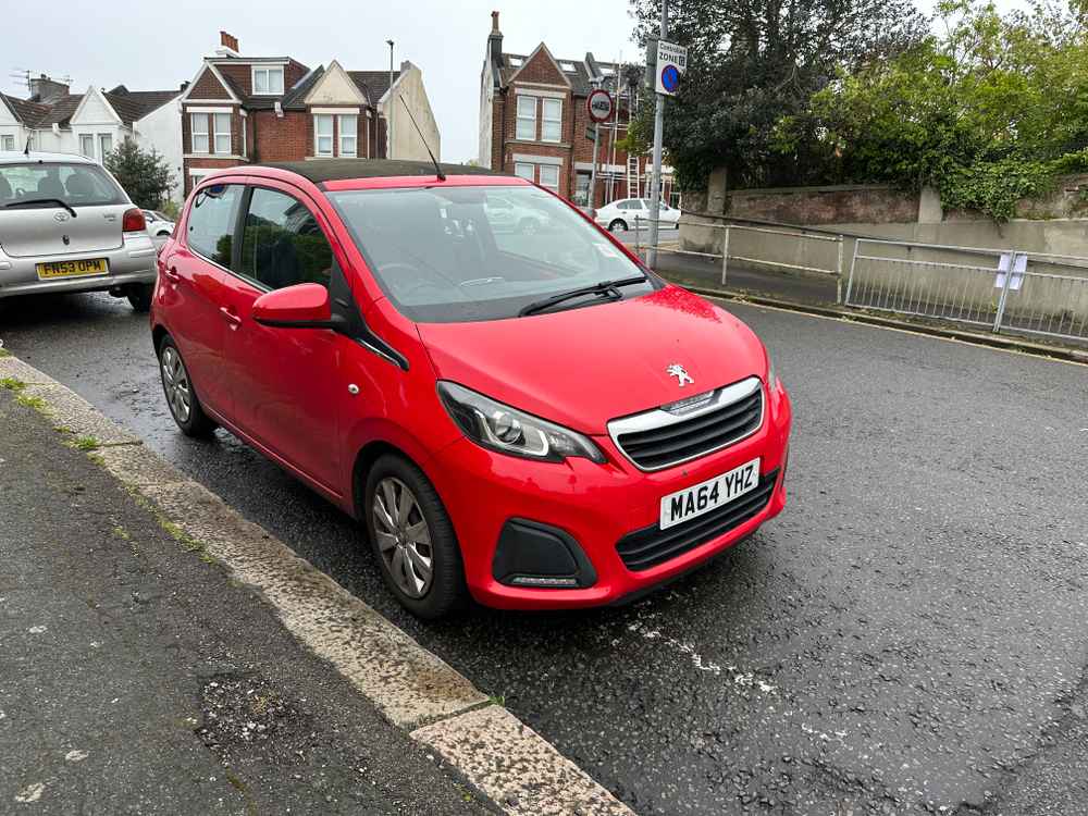 Photograph of MA64 YHZ - a Red Peugeot 108 parked in Hollingdean by a non-resident who uses the local area as part of their Brighton commute. The fifth of six photographs supplied by the residents of Hollingdean.