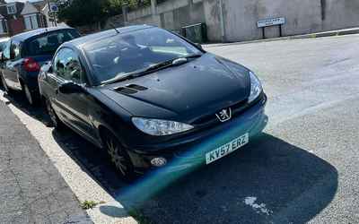 KV57 ERZ, a Black Peugeot 206 parked in Hollingdean