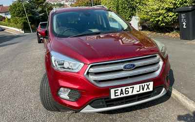 EA67 JVX, a Red Ford Kuga parked in Hollingdean