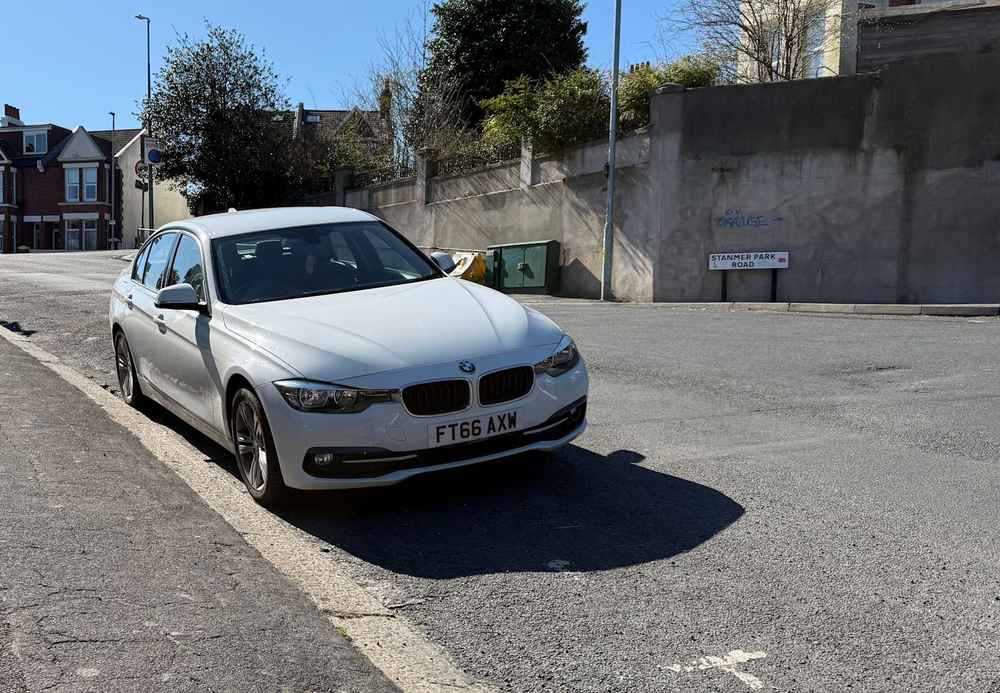 Photograph of FT66 AXW - a White BMW 3 Series parked in Hollingdean by a non-resident who uses the local area as part of their Brighton commute. The fifteenth of twenty-five photographs supplied by the residents of Hollingdean.