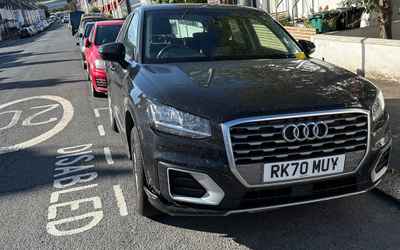 RK70 MUY, a Black Audi Q2 parked in Hollingdean