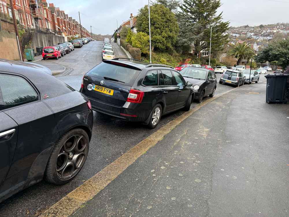 Photograph of HR19 FYW - a Black Skoda Octavia parked in Hollingdean by a non-resident. The twelfth of twelve photographs supplied by the residents of Hollingdean.