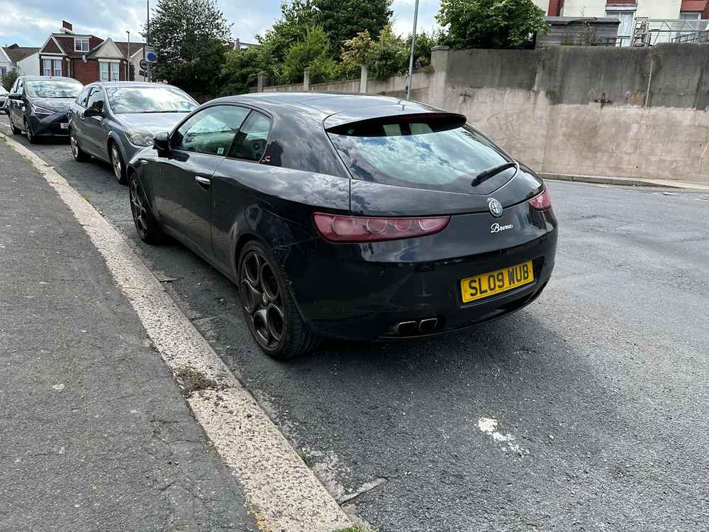 Photograph of SL09 WUB - a Black Alfa Romeo Brera parked in Hollingdean by a non-resident. The twenty-first of forty-four photographs supplied by the residents of Hollingdean.