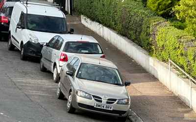 BM04 BRV, a Gold Nissan Almera parked in Hollingdean