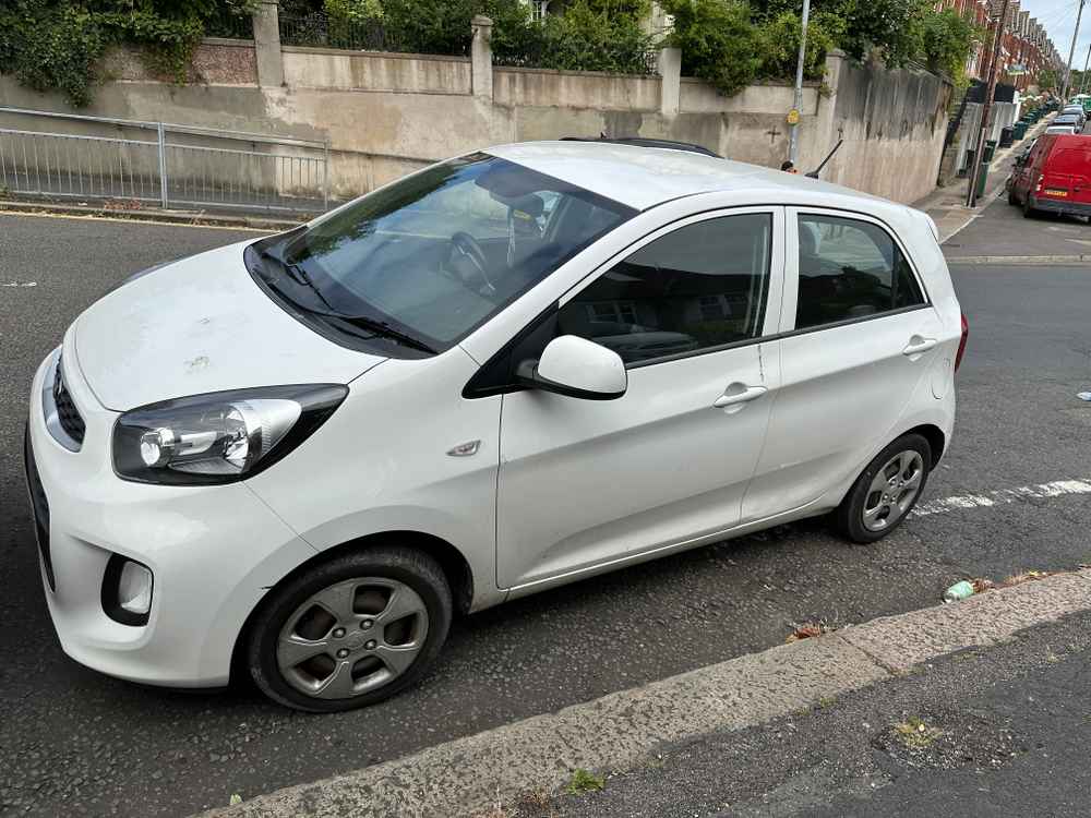 Photograph of GY66 XHV - a White Kia Picanto parked in Hollingdean by a non-resident. The fourth of five photographs supplied by the residents of Hollingdean.