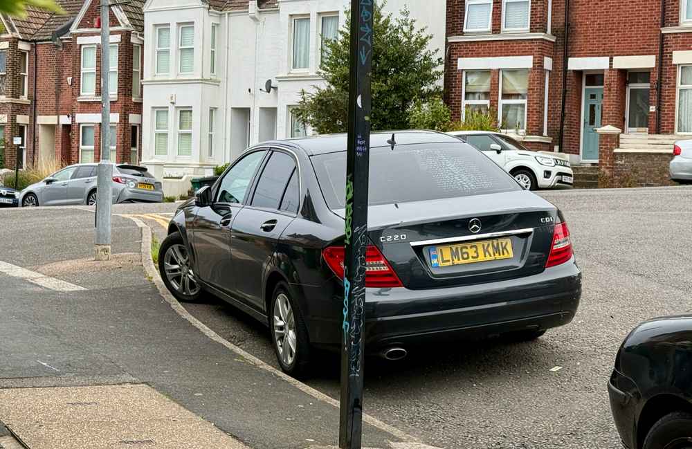 Photograph of LM63 KMK - a Black Mercedes C Class parked in Hollingdean by a non-resident who uses the local area as part of their Brighton commute. The fourth of six photographs supplied by the residents of Hollingdean.