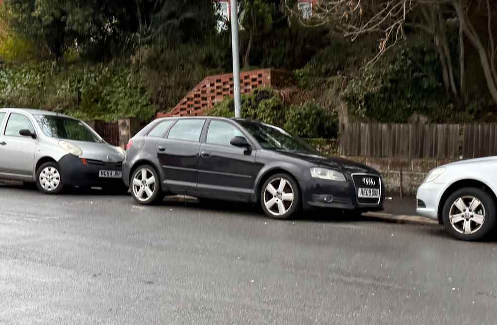 Photograph of RE09 DOU - a Black Audi A3 parked in Hollingdean by a non-resident who uses the local area as part of their Brighton commute. The eleventh of eleven photographs supplied by the residents of Hollingdean.