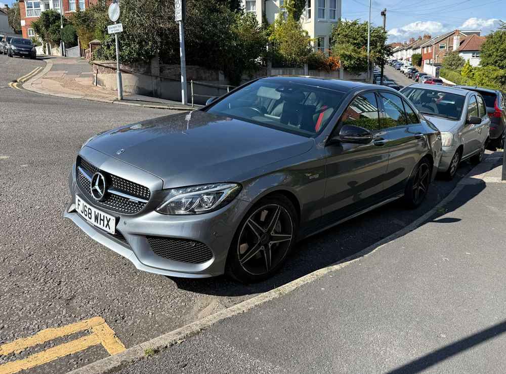 Photograph of FJ68 WHX - a Grey Mercedes C Class parked in Hollingdean by a non-resident. The twenty-third of twenty-eight photographs supplied by the residents of Hollingdean.
