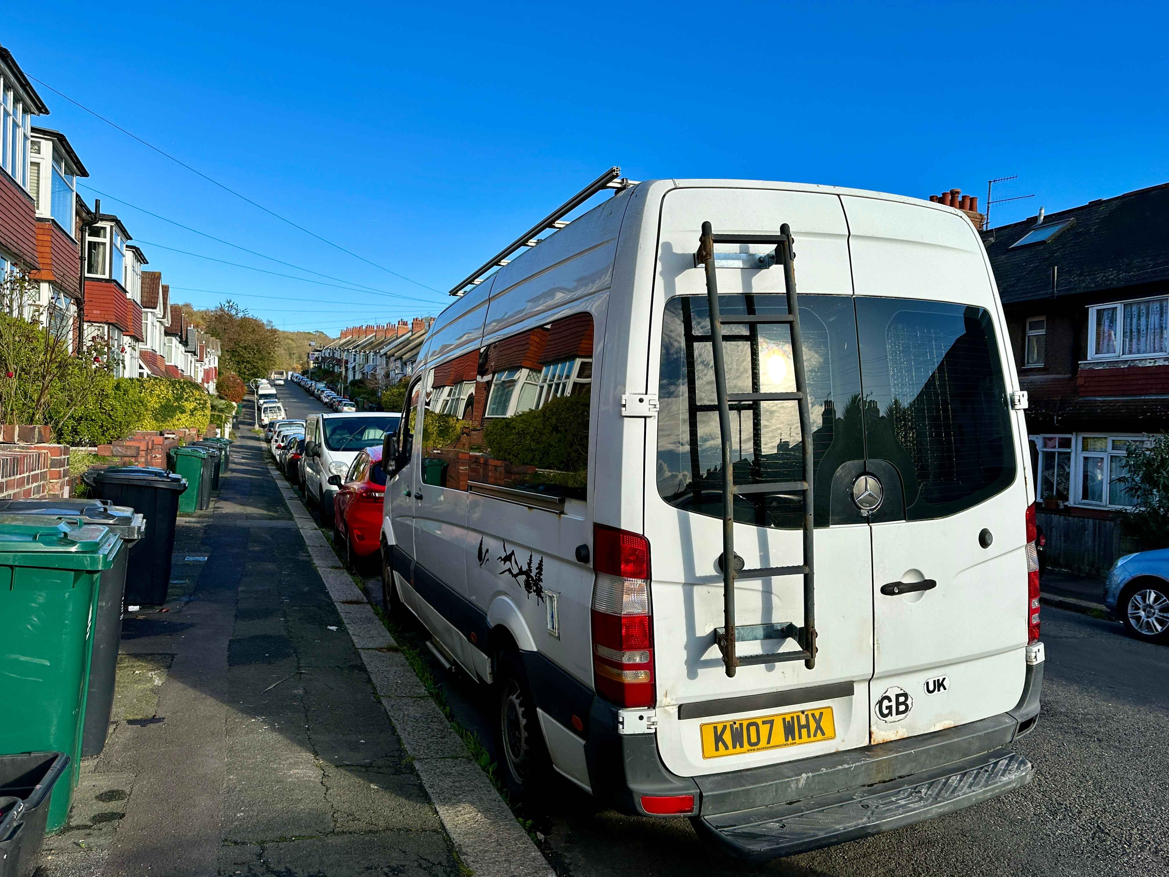 Photograph of KW07 WHX - a White Mercedes Sprinter camper van parked in Hollingdean by a non-resident. The third of four photographs supplied by the residents of Hollingdean.