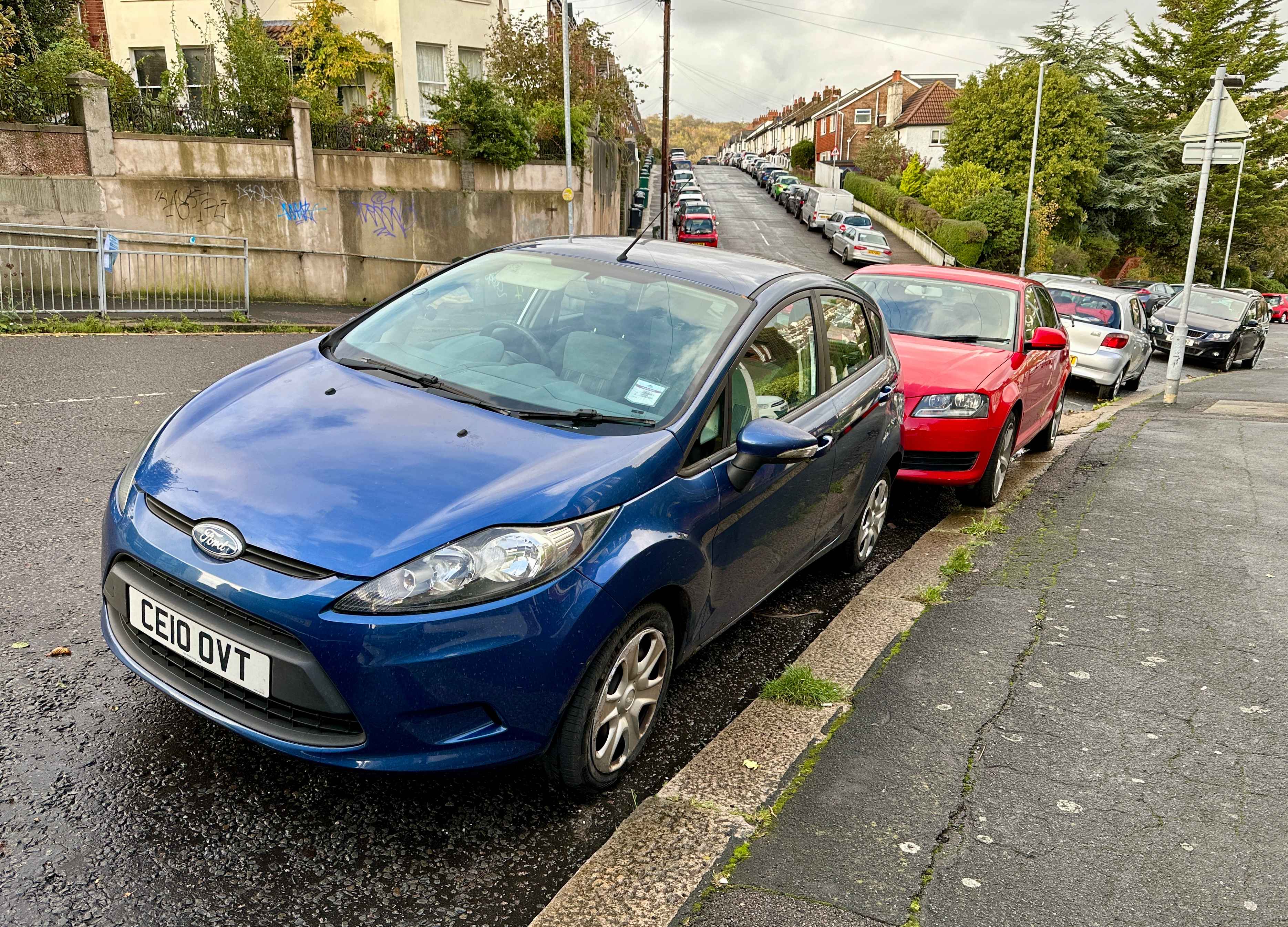 Photograph of CE10 OVT - a Blue Ford Fiesta parked in Hollingdean by a non-resident. The second of two photographs supplied by the residents of Hollingdean.