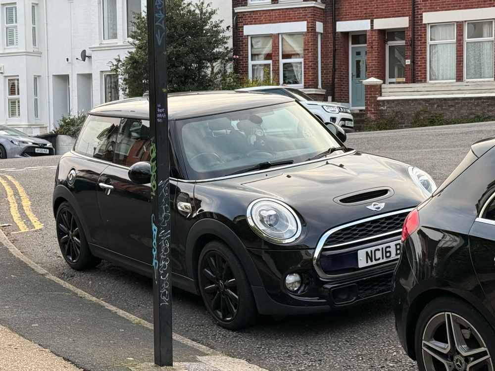 Photograph of NC16 BMU - a Black Mini Cooper parked in Hollingdean by a non-resident who uses the local area as part of their Brighton commute. The seventh of seven photographs supplied by the residents of Hollingdean.