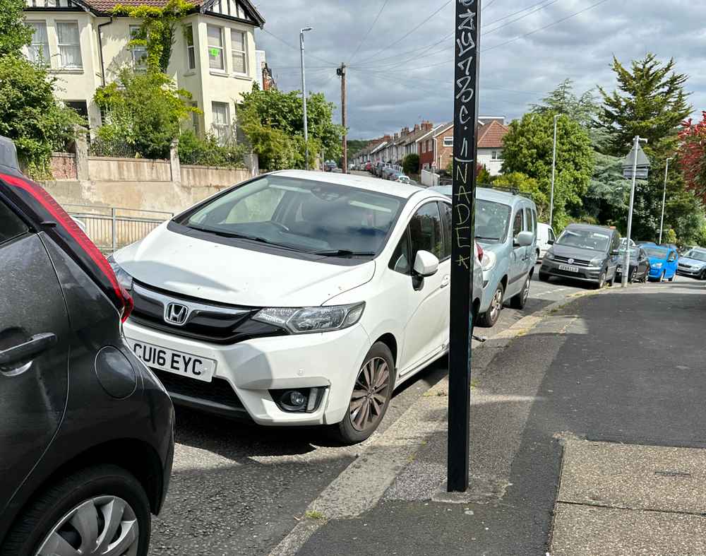 Photograph of CU16 EYC - a White Honda Jazz parked in Hollingdean by a non-resident who uses the local area as part of their Brighton commute. The third of four photographs supplied by the residents of Hollingdean.