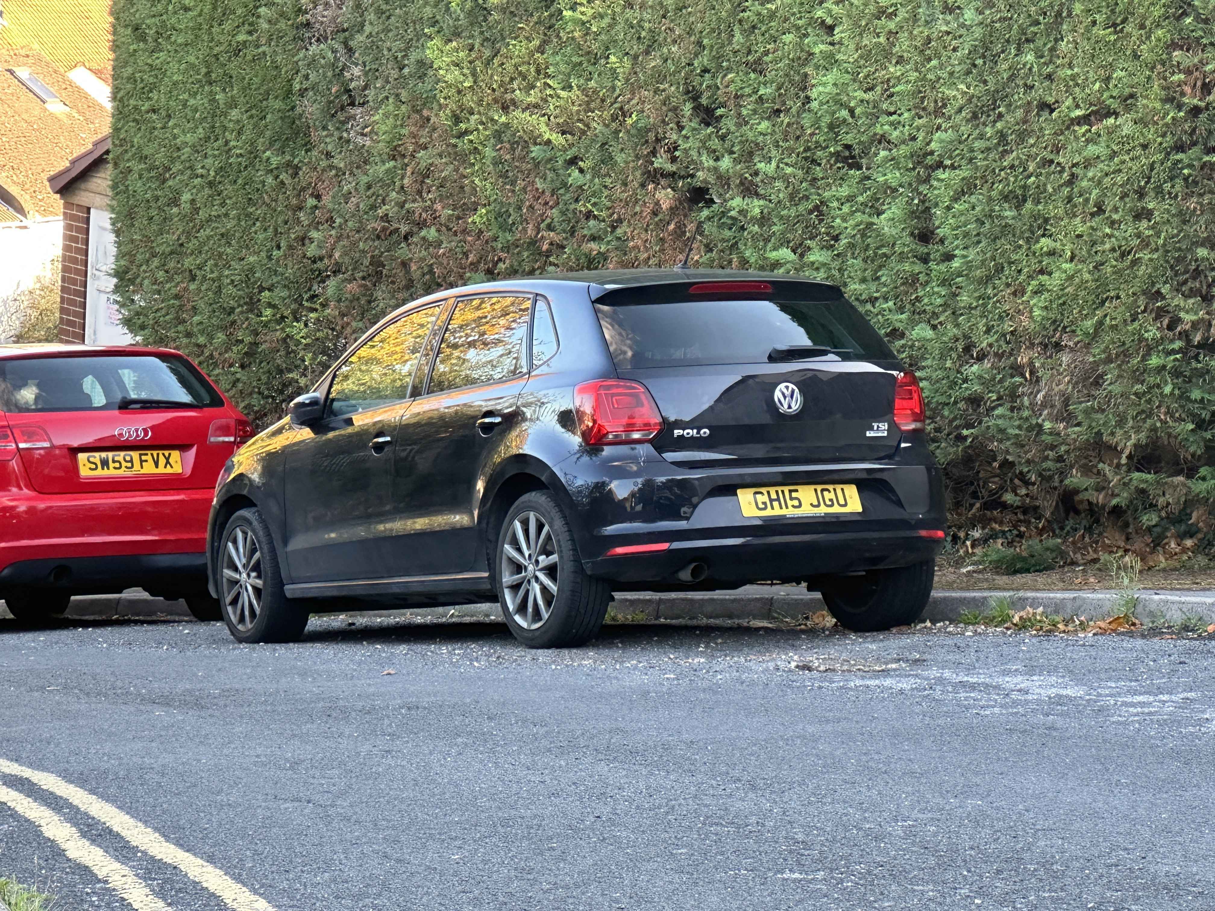 Photograph of GH15 JGU - a Black Volkswagen Polo parked in Hollingdean by a non-resident. The second of three photographs supplied by the residents of Hollingdean.