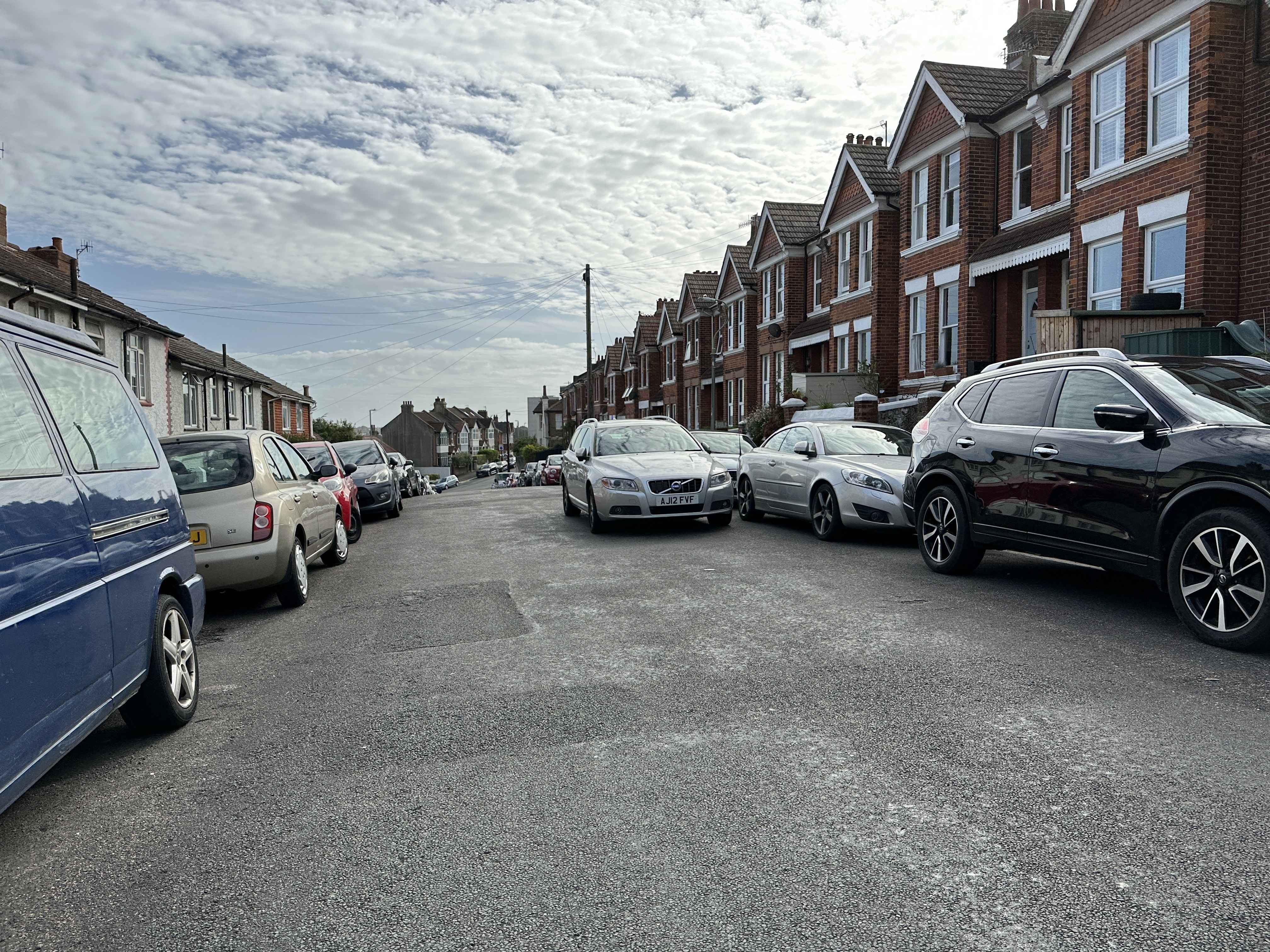 Photograph of AJ12 FVF - a Silver Volvo V70 parked in Hollingdean. The first of two photographs supplied by the residents of Hollingdean.