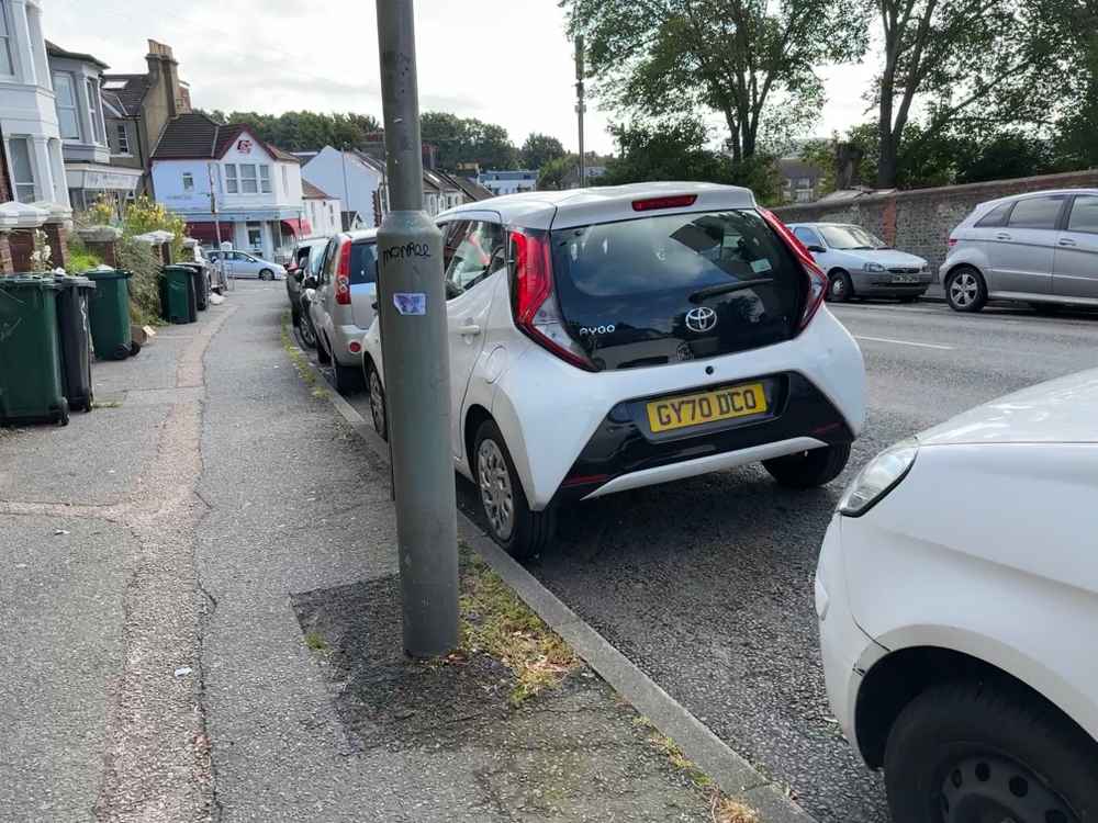 Photograph of GY70 DCO - a White Toyota Aygo parked in Hollingdean by a non-resident. The second of two photographs supplied by the residents of Hollingdean.