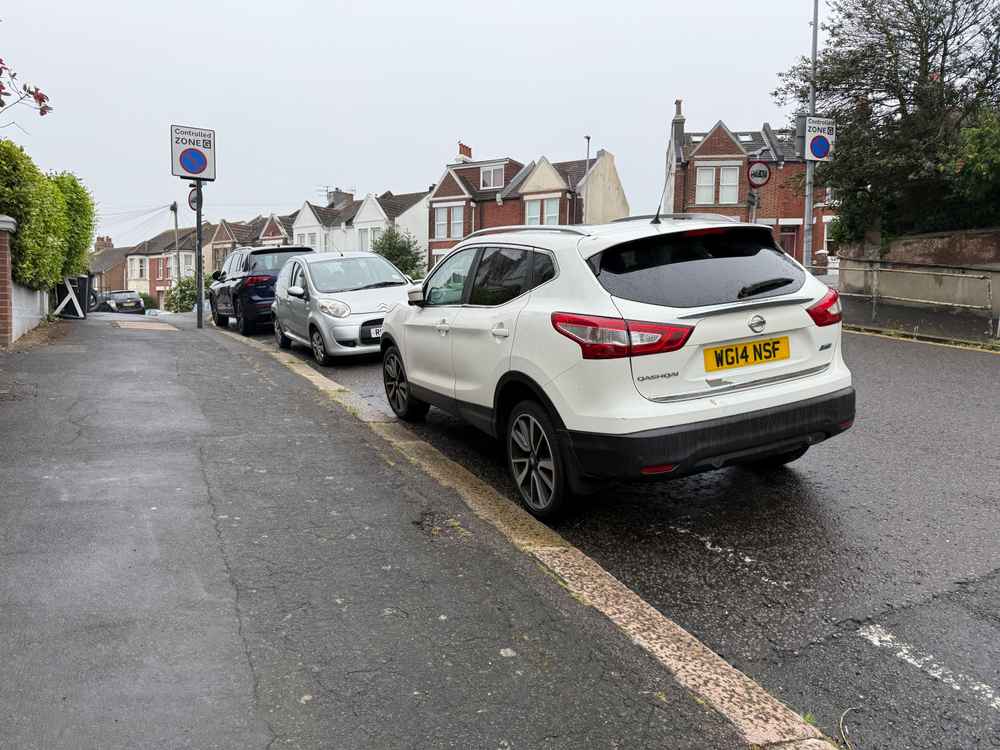 Photograph of WG14 NSF - a White Nissan Qashqai parked in Hollingdean by a non-resident who uses the local area as part of their Brighton commute. The eighth of eight photographs supplied by the residents of Hollingdean.