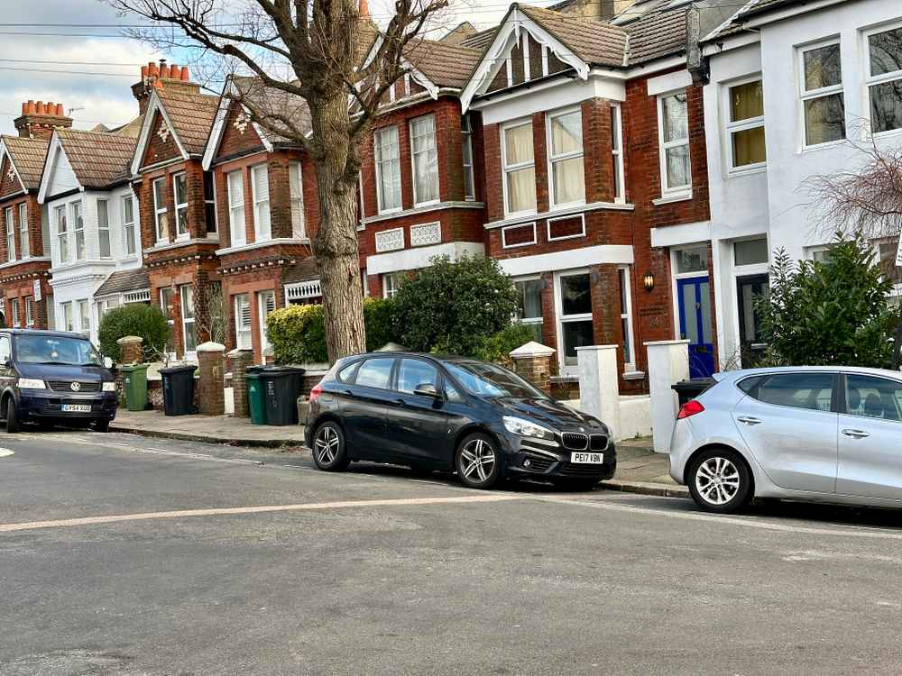 Photograph of PE17 VBN - a Black BMW 2 Series parked in Hollingdean by a non-resident. The third of three photographs supplied by the residents of Hollingdean.