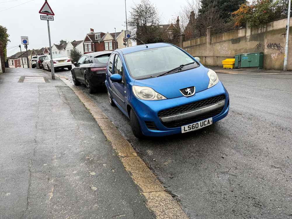 Photograph of LS60 UCA - a Blue Peugeot 107 parked in Hollingdean by a non-resident. The thirty-first of thirty-one photographs supplied by the residents of Hollingdean.