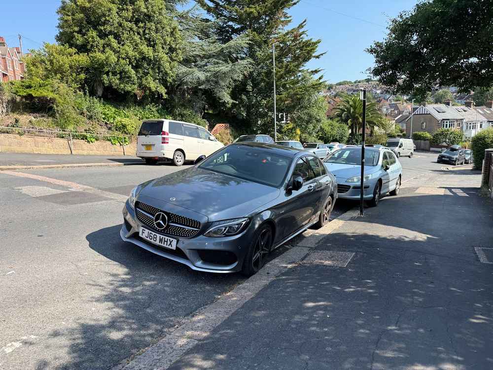 Photograph of FJ68 WHX - a Grey Mercedes C Class parked in Hollingdean by a non-resident. The twentieth of twenty-eight photographs supplied by the residents of Hollingdean.