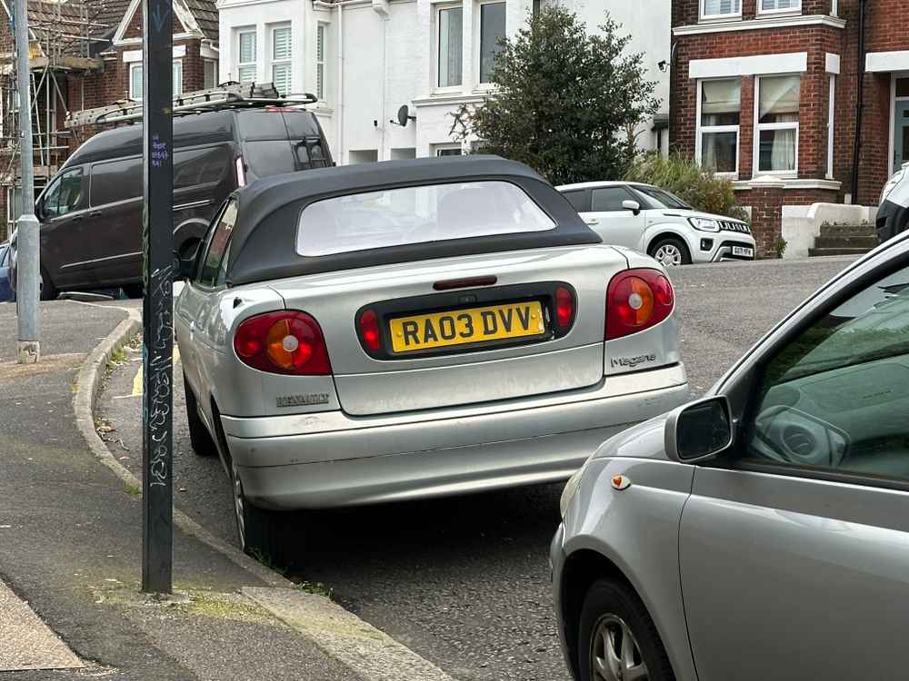 Photograph of RA03 DVV - a Silver Renault Megane parked in Hollingdean by a non-resident. 