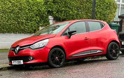 P77 OBS, a Red Renault Clio parked in Hollingdean