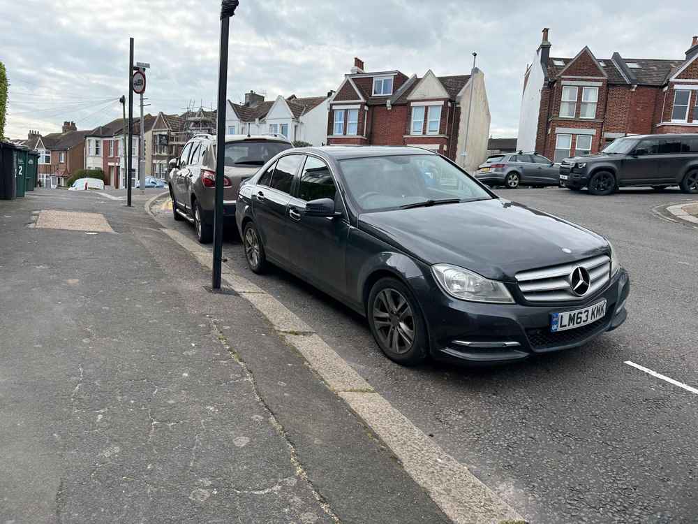 Photograph of LM63 KMK - a Black Mercedes C Class parked in Hollingdean by a non-resident who uses the local area as part of their Brighton commute. The thirteenth of thirteen photographs supplied by the residents of Hollingdean.