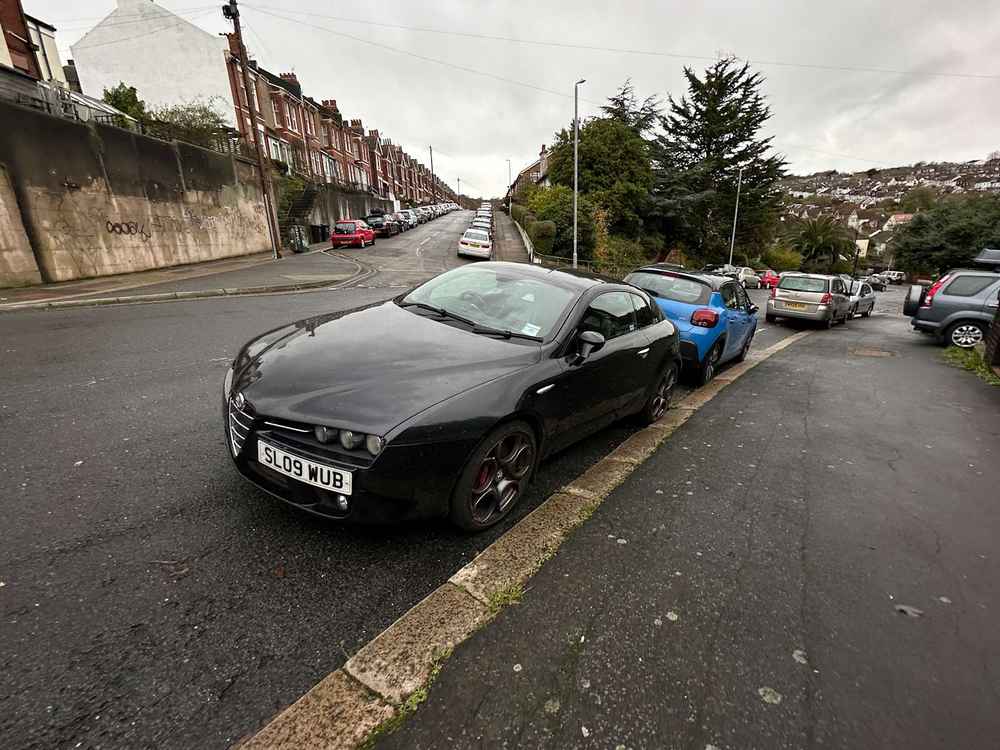 Photograph of SL09 WUB - a Black Alfa Romeo Brera parked in Hollingdean by a non-resident. The twelfth of forty-four photographs supplied by the residents of Hollingdean.