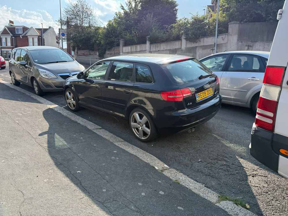 Photograph of RE09 DOU - a Black Audi A3 parked in Hollingdean by a non-resident who uses the local area as part of their Brighton commute. The ninth of nine photographs supplied by the residents of Hollingdean.
