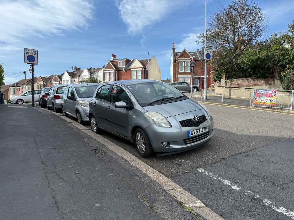 Photograph of GV57 JYH - a Grey Toyota Yaris parked in Hollingdean by a non-resident. The second of two photographs supplied by the residents of Hollingdean.