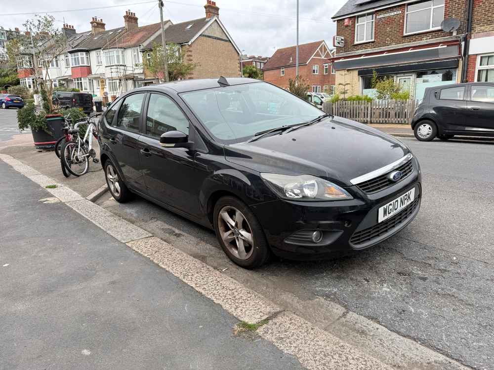 Photograph of WG10 NPK - a Black Ford Focus parked in Hollingdean by a non-resident. The twelfth of thirteen photographs supplied by the residents of Hollingdean.