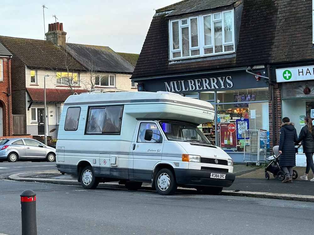 Photograph of R384 ORC - a Beige Volkswagen Transporter camper van parked in Hollingdean by a non-resident, and potentially abandoned. The tenth of fifteen photographs supplied by the residents of Hollingdean.