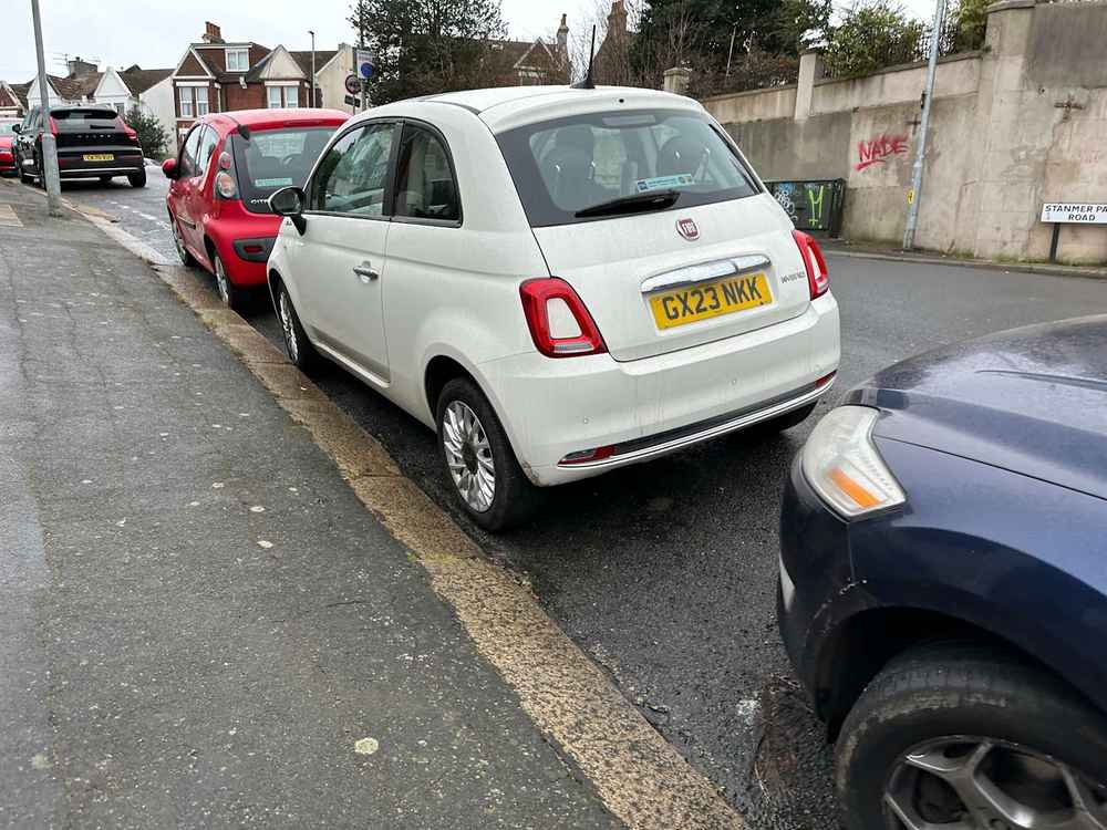 Photograph of GX23 NKK - a White Fiat 500 parked in Hollingdean by a non-resident. The first of six photographs supplied by the residents of Hollingdean.