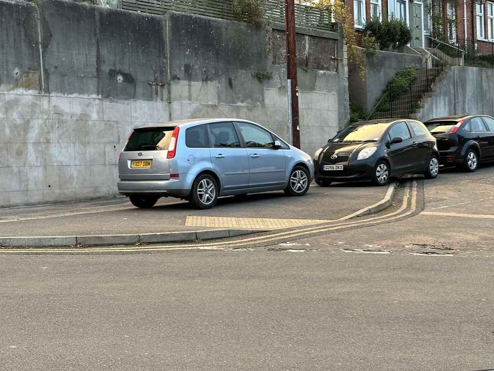 Photograph of GU56 DKX - a Black Toyota Yaris parked in Hollingdean by a non-resident who uses the local area as part of their Brighton commute. The second of three photographs supplied by the residents of Hollingdean.