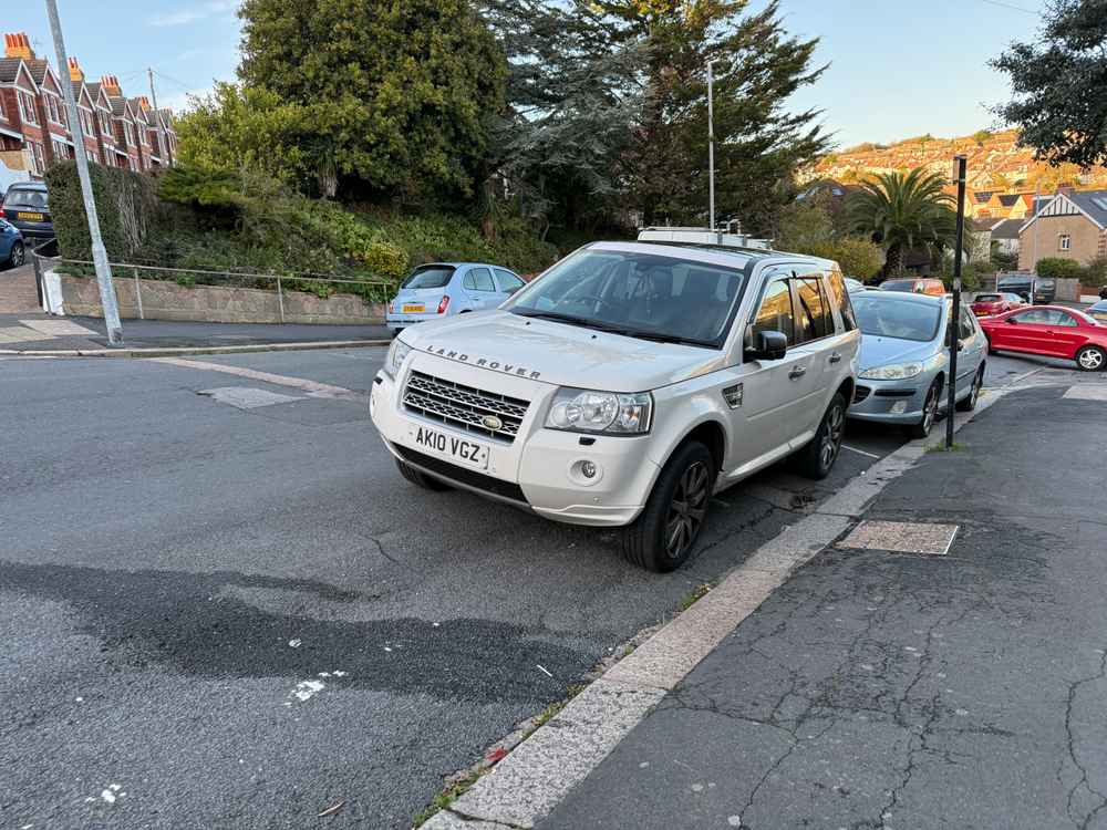 Photograph of AK10 VGZ - a White Land Rover Freelander parked in Hollingdean by a non-resident. The eleventh of eleven photographs supplied by the residents of Hollingdean.