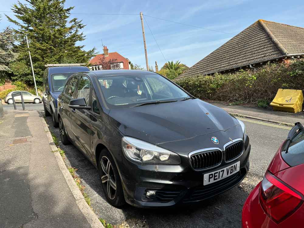 Photograph of PE17 VBN - a Black BMW 2 Series parked in Hollingdean by a non-resident. The first of three photographs supplied by the residents of Hollingdean.