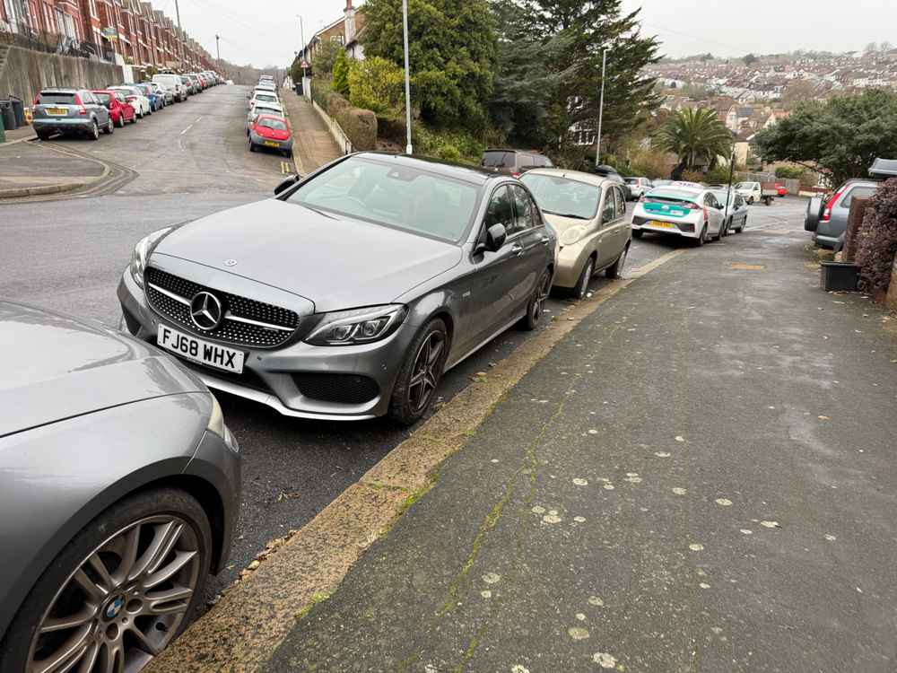 Photograph of FJ68 WHX - a Grey Mercedes C Class parked in Hollingdean by a non-resident. The thirteenth of thirteen photographs supplied by the residents of Hollingdean.