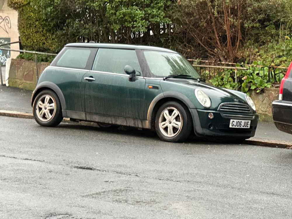 Photograph of GJ06 JUE - a Green Mini Cooper parked in Hollingdean by a non-resident. The fifth of fourteen photographs supplied by the residents of Hollingdean.