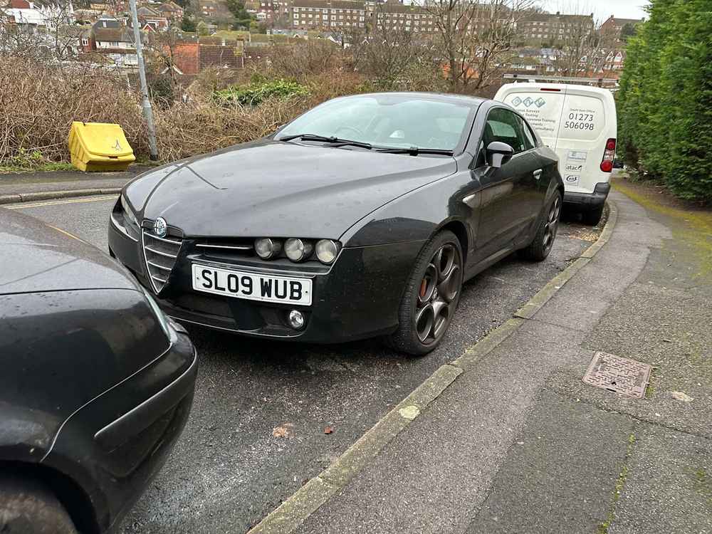 Photograph of SL09 WUB - a Black Alfa Romeo Brera parked in Hollingdean by a non-resident. The sixteenth of forty-four photographs supplied by the residents of Hollingdean.