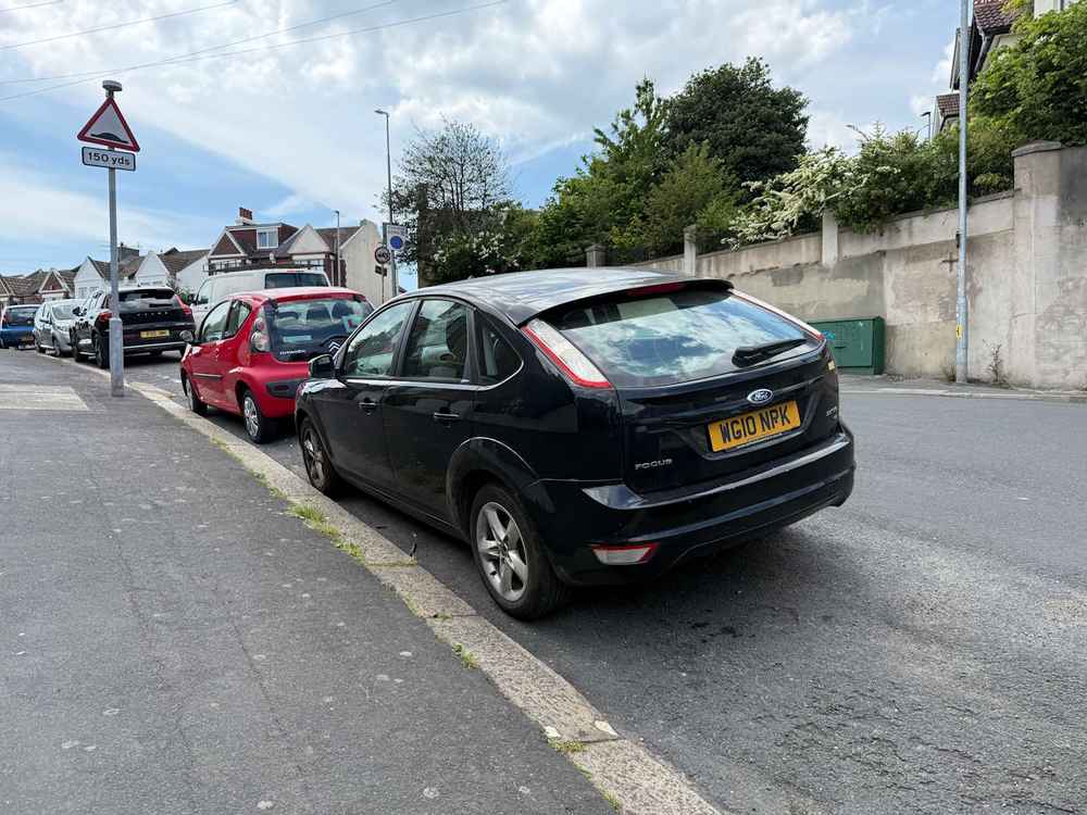 Photograph of WG10 NPK - a Black Ford Focus parked in Hollingdean by a non-resident. The eighth of seventeen photographs supplied by the residents of Hollingdean.