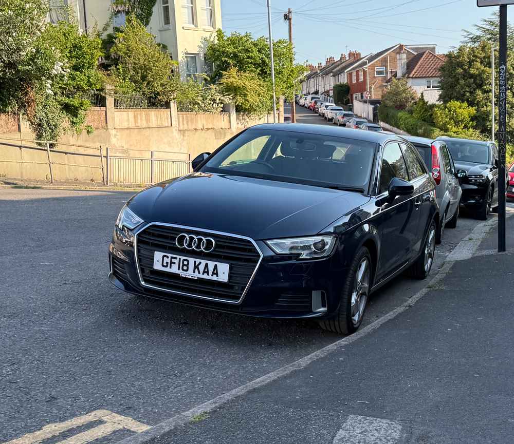 Photograph of GF18 KAA - a Blue Audi A3 parked in Hollingdean by a non-resident. The second of two photographs supplied by the residents of Hollingdean.