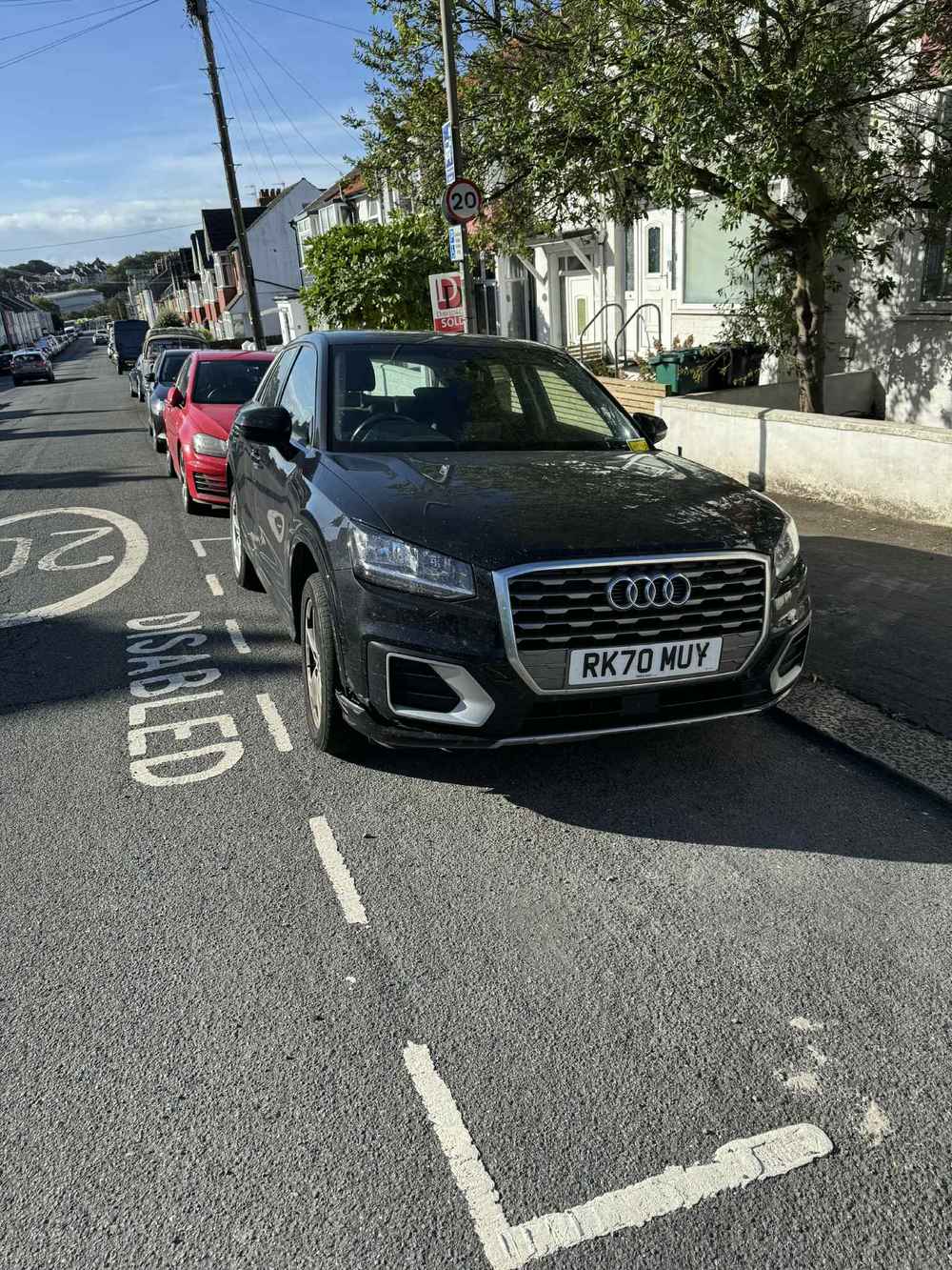 Photograph of RK70 MUY - a Black Audi Q2 parked in Hollingdean by a non-resident. The second of three photographs supplied by the residents of Hollingdean.
