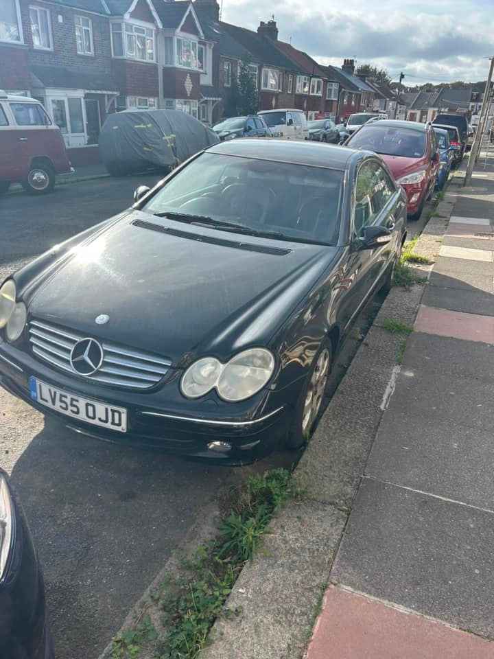 Photograph of LV55 OJD - a Black Mercedes CLK parked in Hollingdean by a non-resident, and potentially abandoned. The first of two photographs supplied by the residents of Hollingdean.